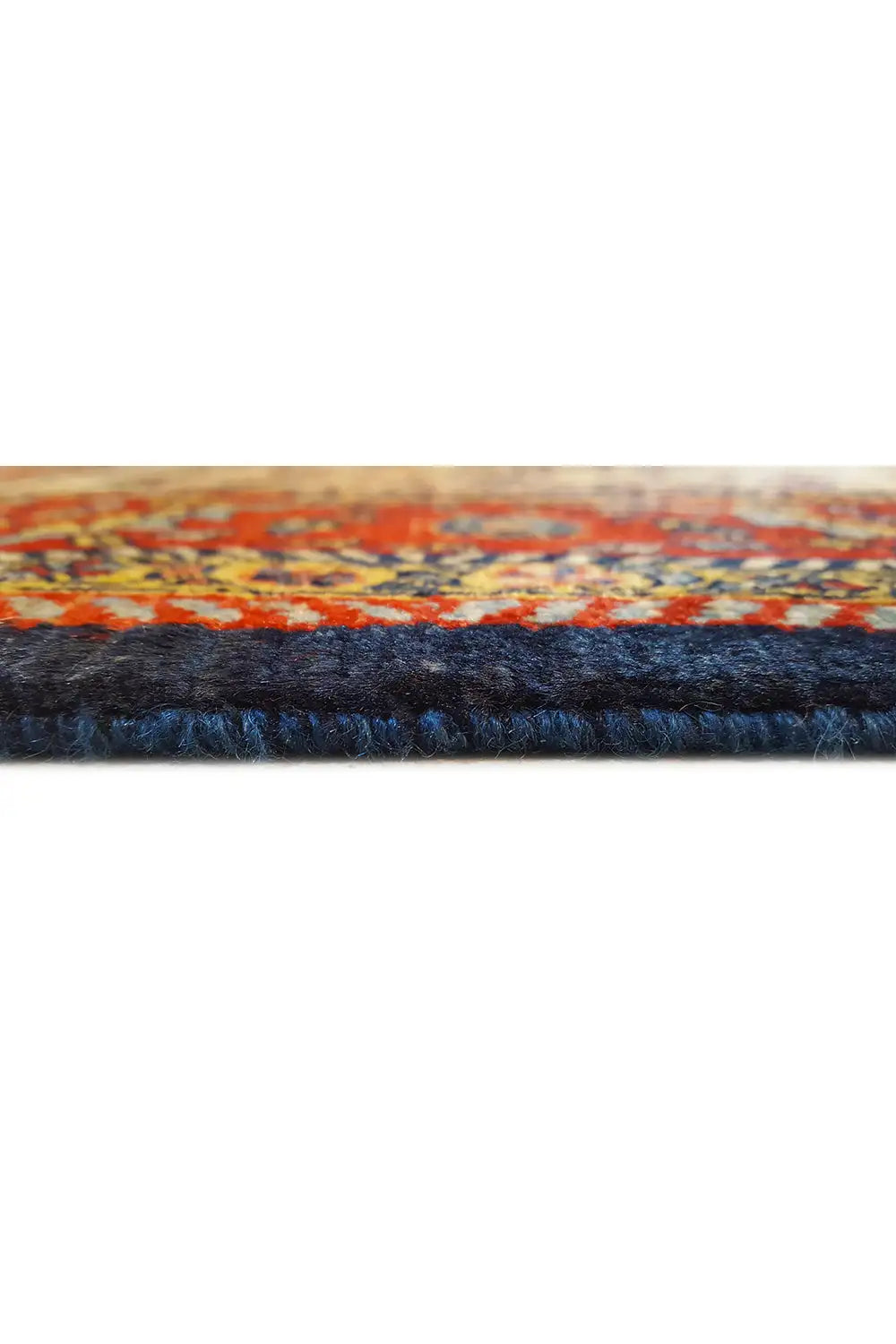 Rug edge with a multicolored ornamental border and dark trim