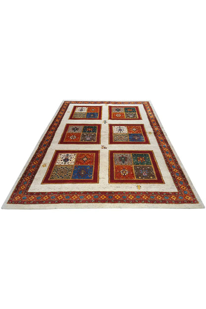 Rug with geometric squares, a red border, and a beige background, laid flat