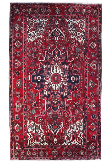 Oriental rug 353x208 cm, red medallion design with geometric patterns and border