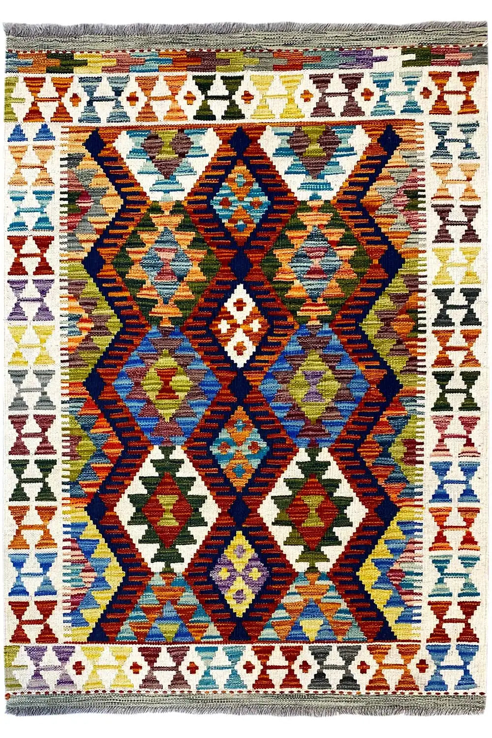 Kilim rug with a geometric pattern, multicolored, rectangular, fringed
