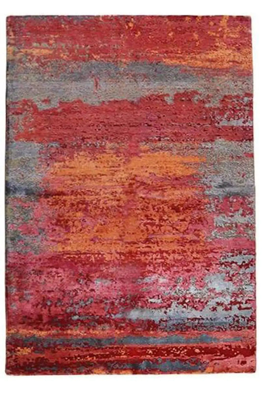 Front view of a rug with abstract stripes in red, gray, blue, and yellow