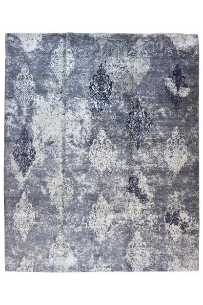 Designer rug with light and dark ornaments on a gray-blue background