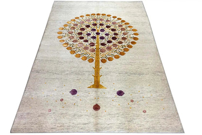 Gabbeh rug at an angle: Tree of Life on light beige with colorful circles