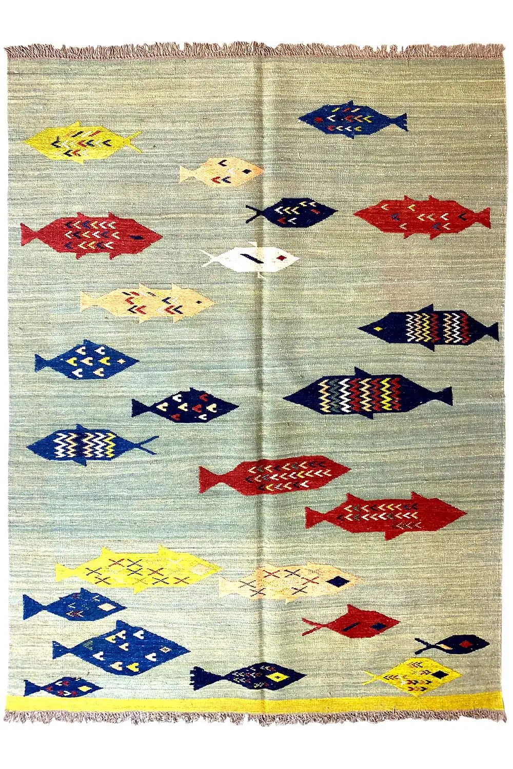 Multicolored rectangular kilim with fish motifs and fringes along the edge