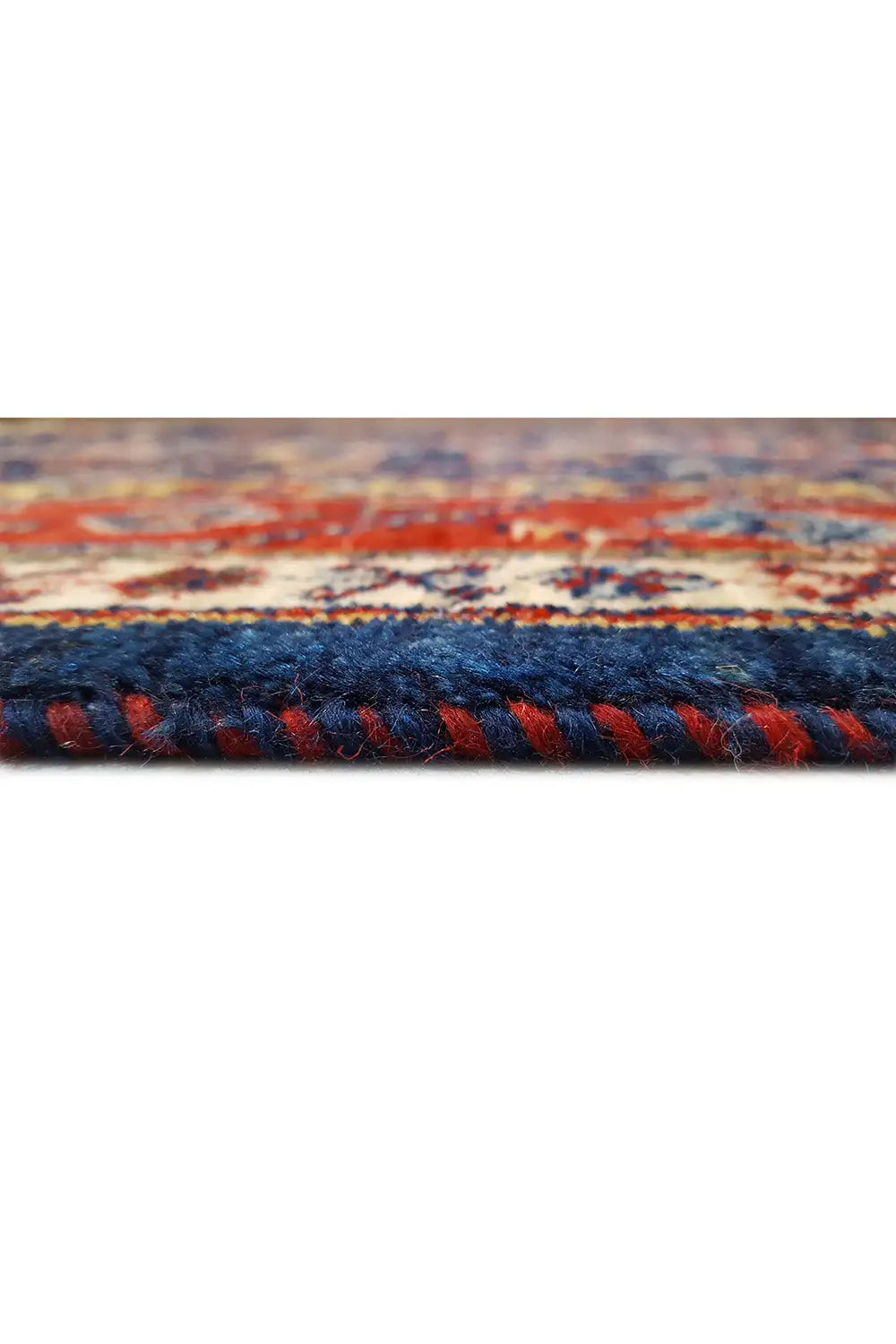 Qashqai exclusive rug, close-up of edge fringes, blue pattern, red-orange accents
