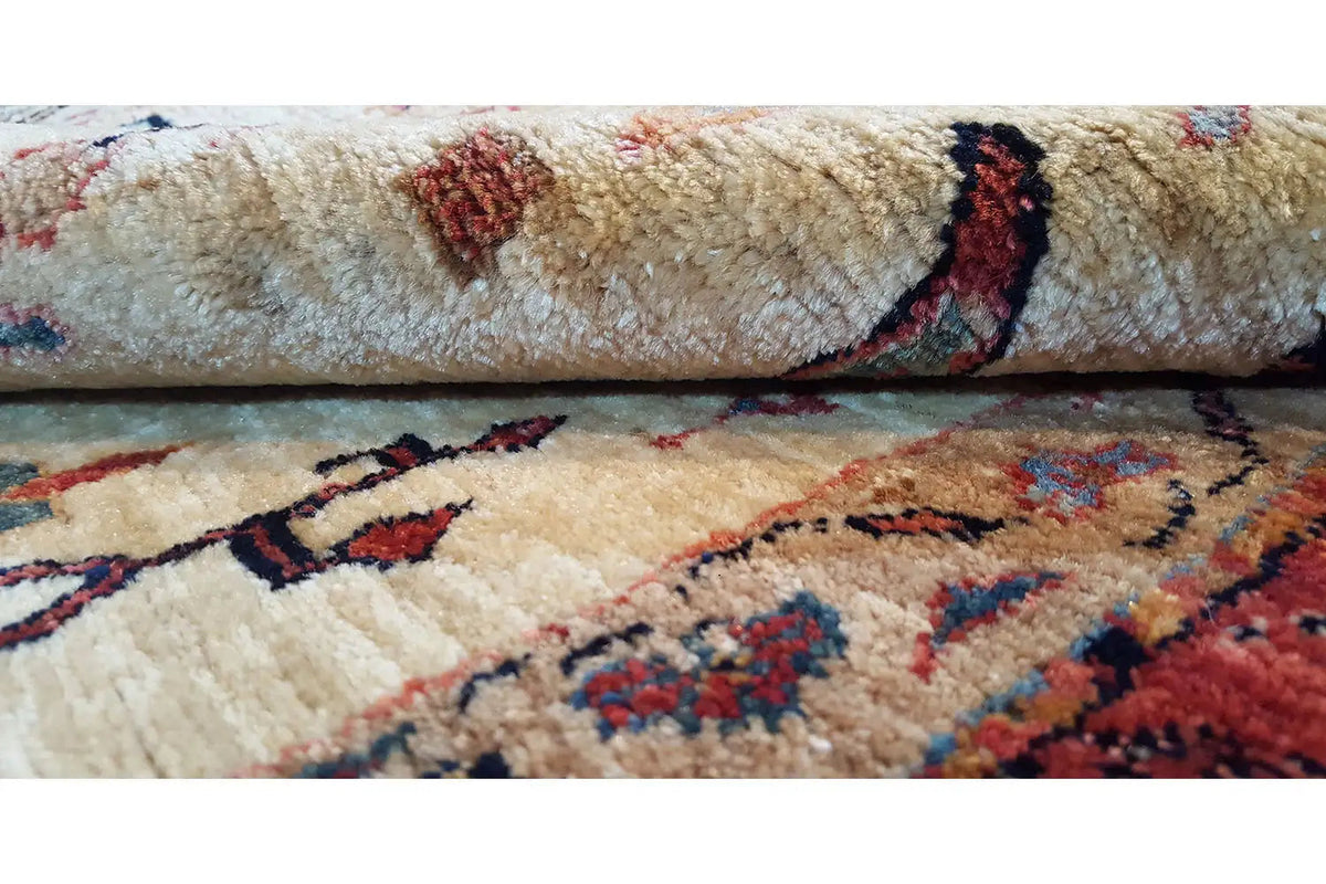 Oriental rug with a relief loop pile and multicolored pattern, right edge visible.