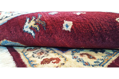Qashqai exclusive rug in burgundy with a geometric pattern and hem