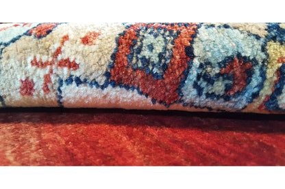 Carpet detail with a multicolored pattern and fine weave, short pile