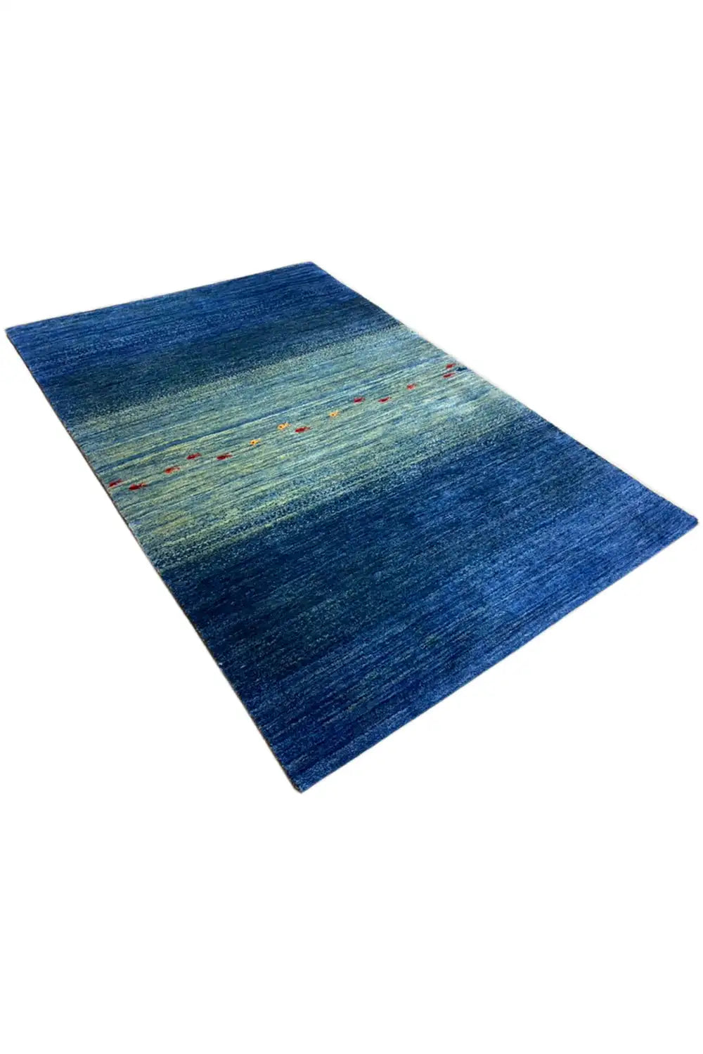Blue carpet laid diagonally, horizontal stripes and fine, colorful dots