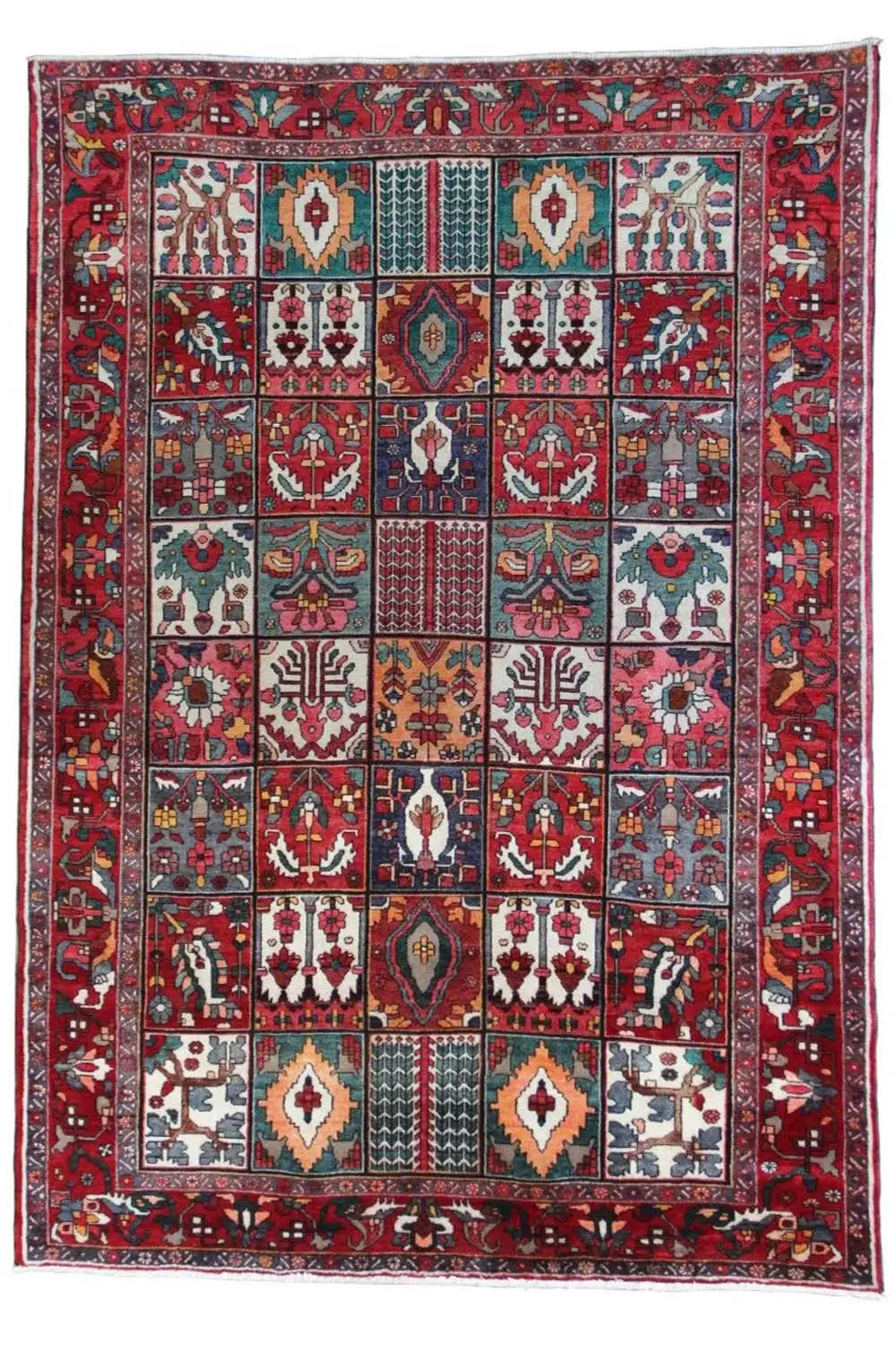 Oriental rug, frontal view, with a red field and lattice ornaments in several colors, 315×220 cm