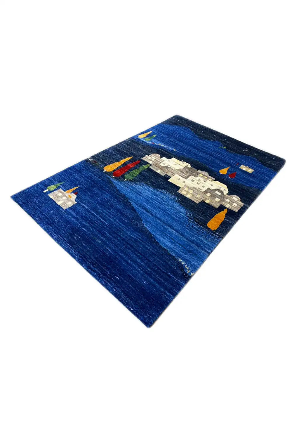 Gabbeh rug, blue pattern with white buildings and colorful candles, laid at an angle