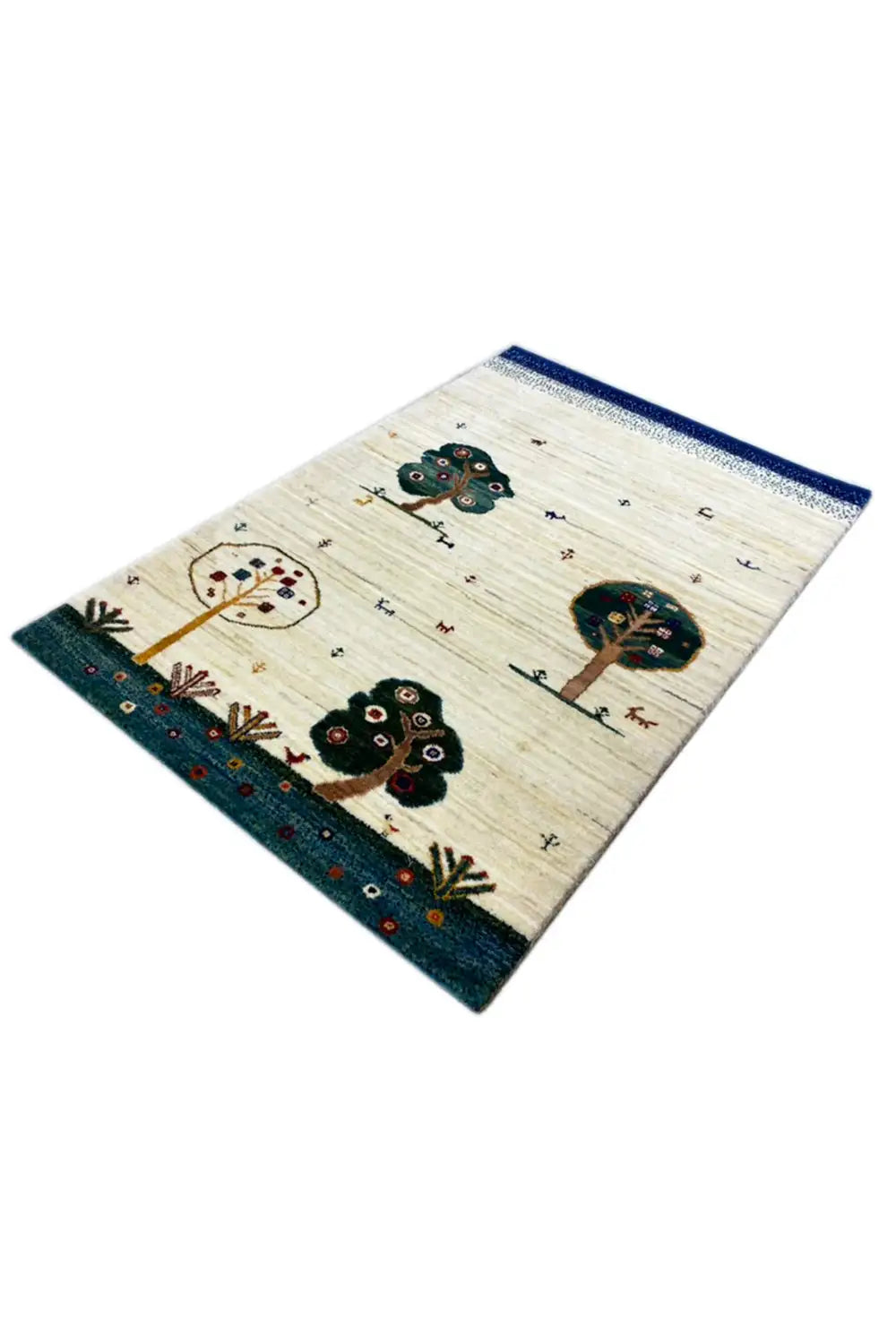 Rug, diagonal view: light beige background with tree and animal motifs, blue-bordered edge