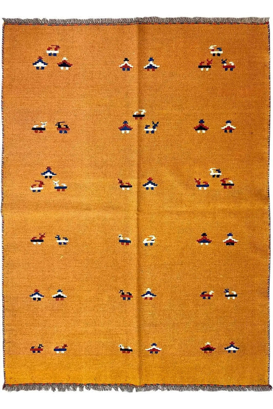 Ochre-brown kilim rug with a dense multicolored pattern, divided in the middle and fringed