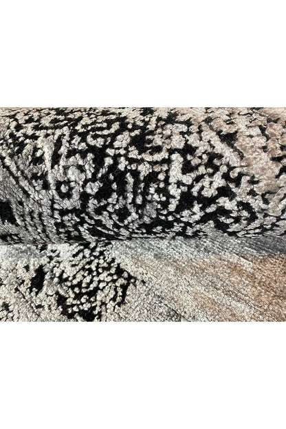 Carpet detail with light and dark dot pattern, dense pile
