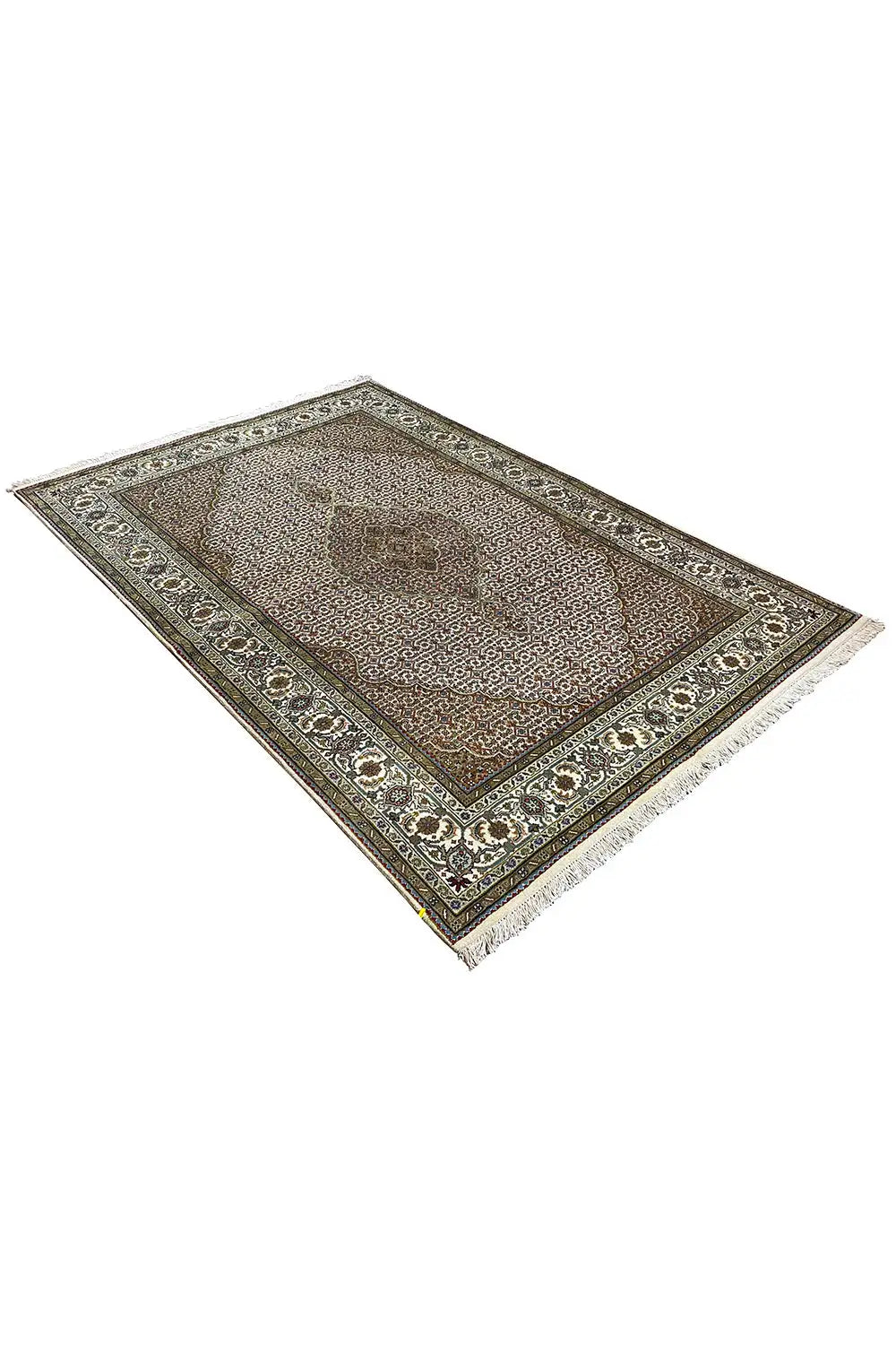 Oriental rug viewed from above, brown-beige background with a medallion and a wide border