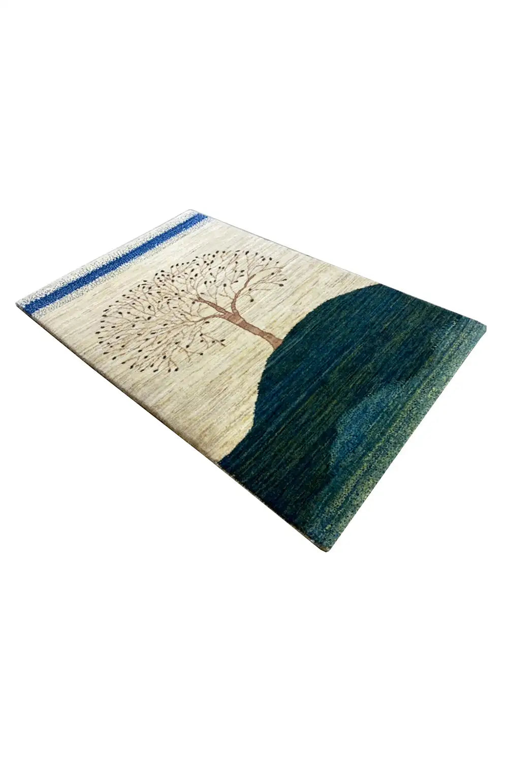 Gabbeh rug laid at an angle, tree motif with a blue-green hill and narrow decorative border