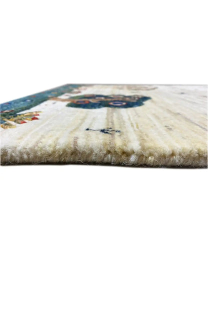 Gabbeh rug 119x75 cm with blue border, dense pile, and central tree motif