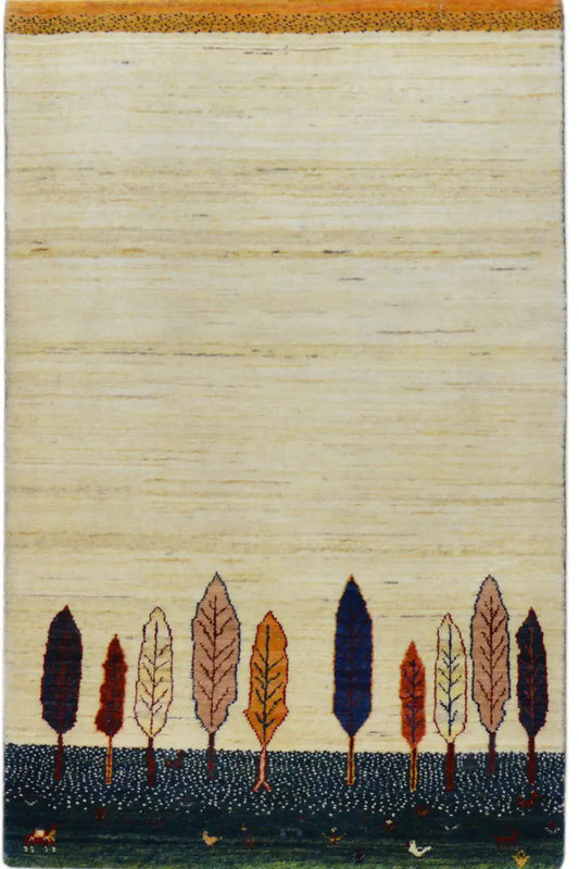 Gabbeh rug with a light background and tree and leaf motif, dark blue border