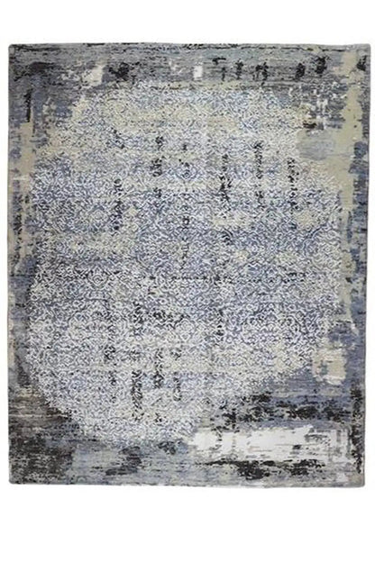 Square rug with a blue-gray vintage look and irregular brushstrokes