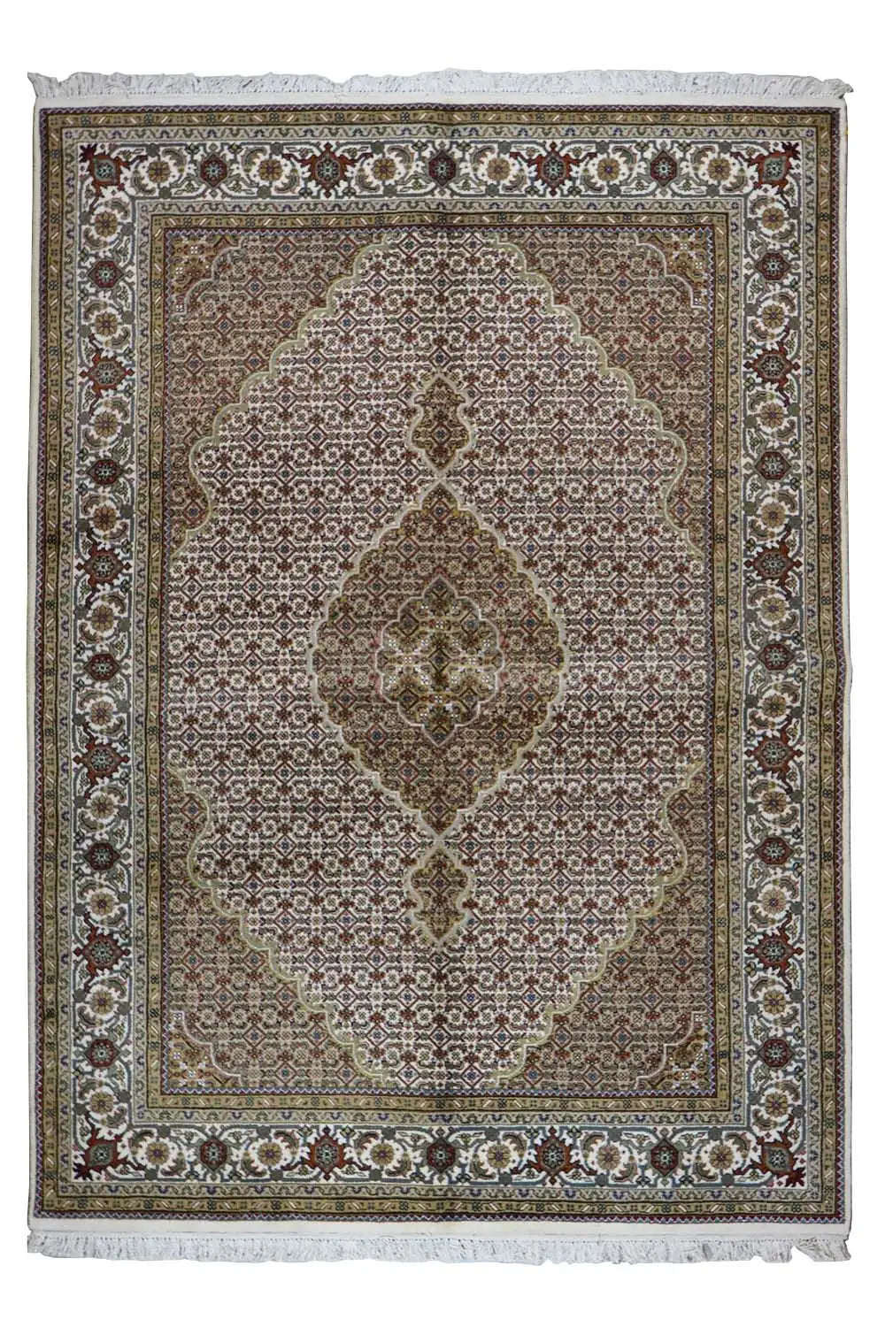 Oriental rug with a brown-gray background, ornamental medallion, and fringes along the edge