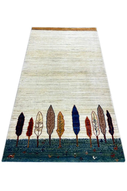 Gabbeh rug 161x87 cm with a light beige loop pattern and a row of trees on a dark blue background