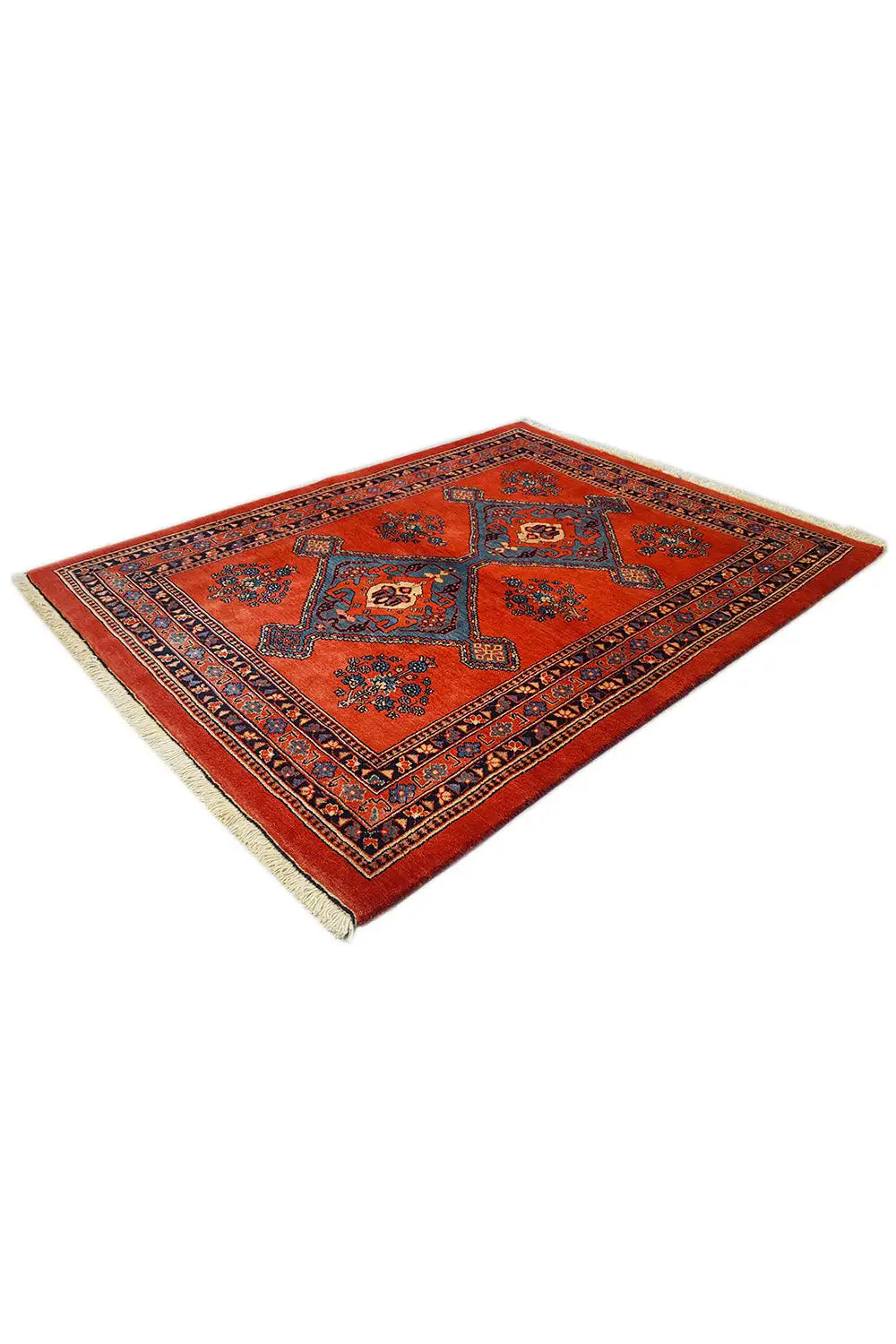 Corner view: red carpet with a blue border and medallion pattern