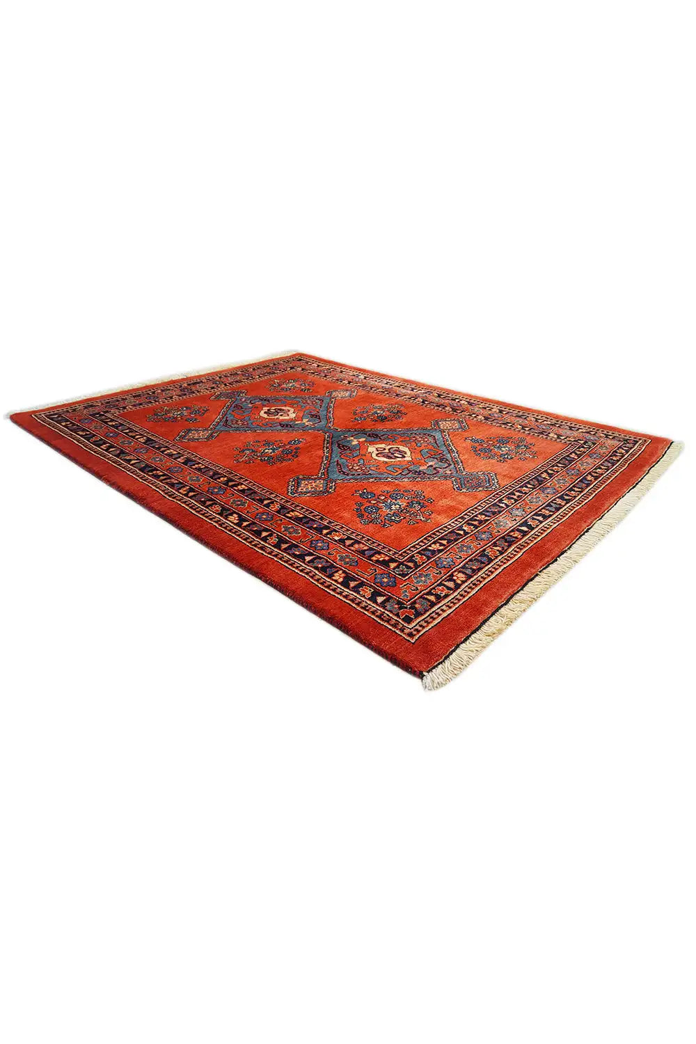 Diamond and medallion patterns on a red carpet with a blue-bordered edge