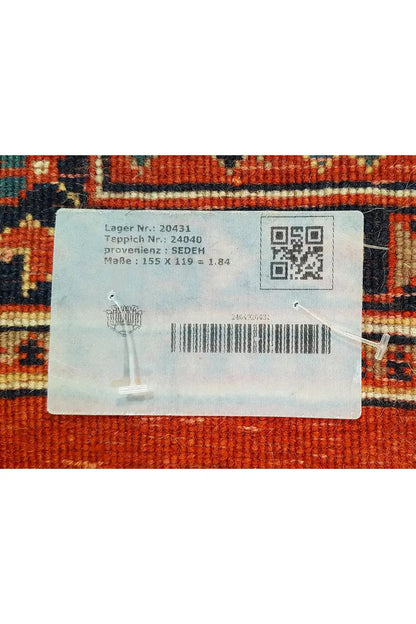 Carpet with label and QR code; dimensions 155 x 119 cm visible