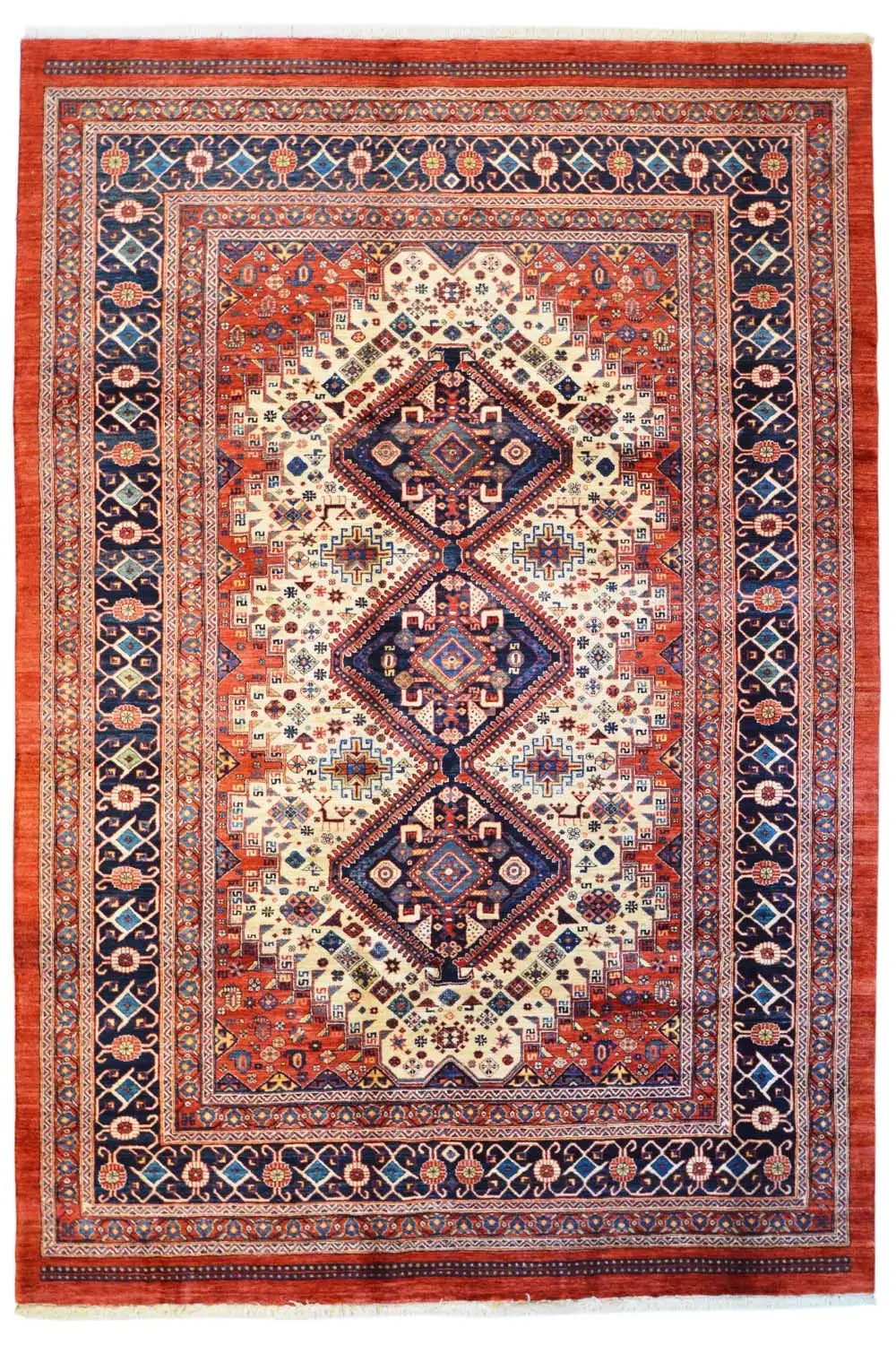 Rectangular oriental rug with a red and blue medallion pattern and border