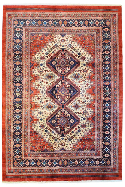 Rectangular oriental rug with a red and blue medallion pattern and border
