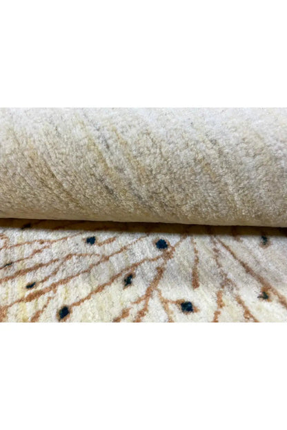 Gabbeh rug (157x86 cm) textile detail: tree design and pile in off-white with brown accents
