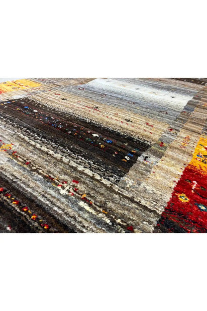 Gabbeh rug (136x68 cm) close-up: striped pattern in gray, beige, and red accents