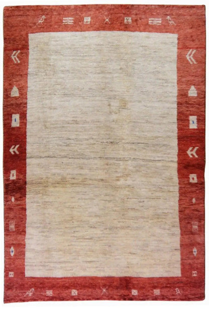 Gabbeh rug 200x133 cm with a red border and a beige, uniform center