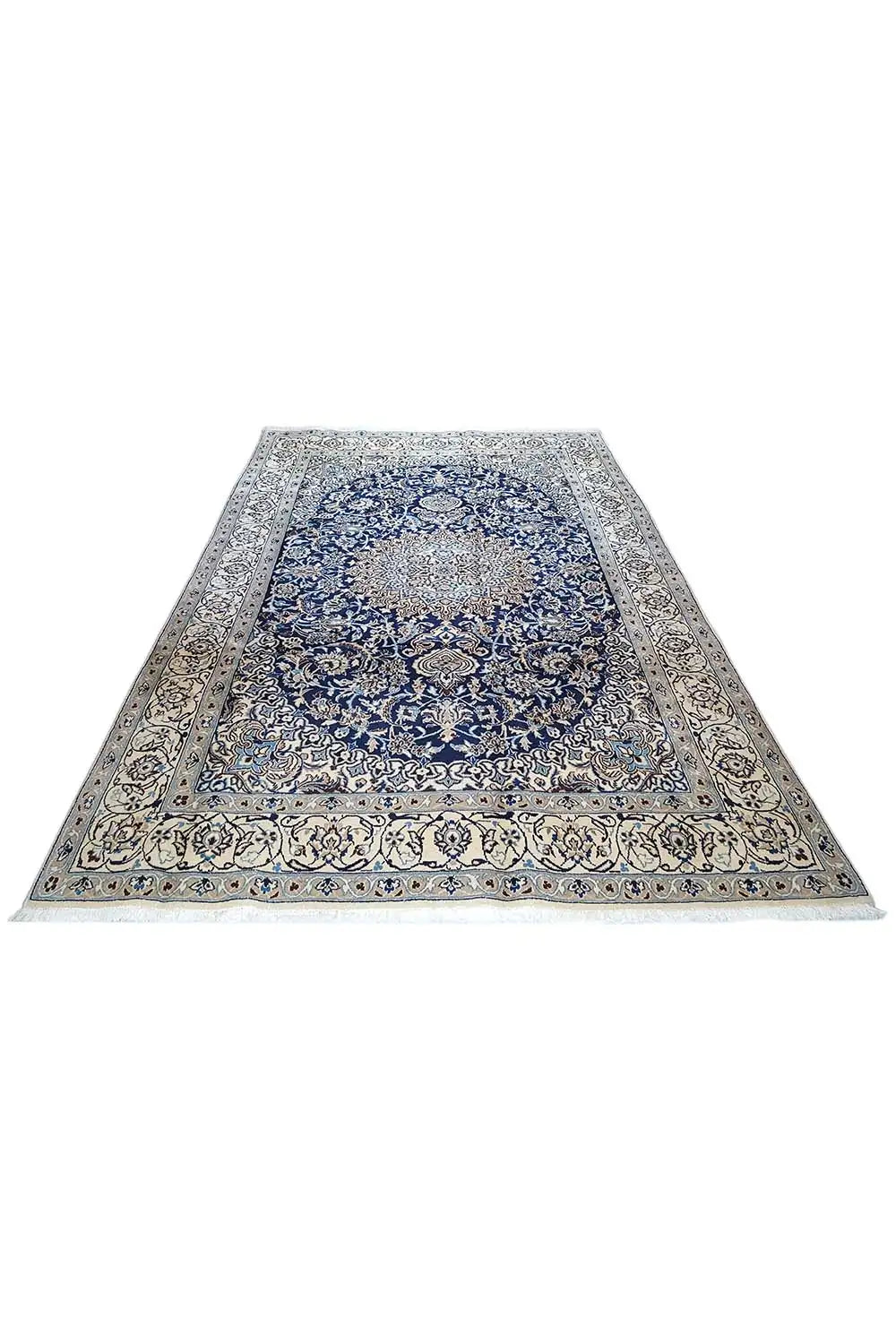 Beige oriental rug with a blue medallion pattern and wide border decoration.