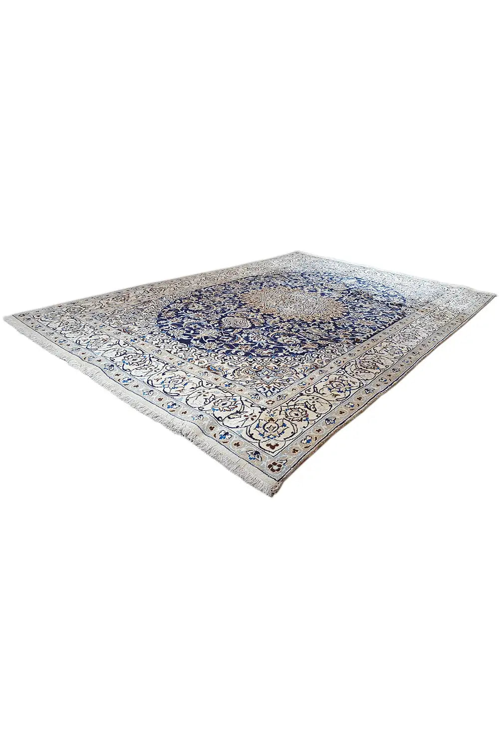 Corner view: flat Oriental rug with a blue medallion and surrounding ornaments.