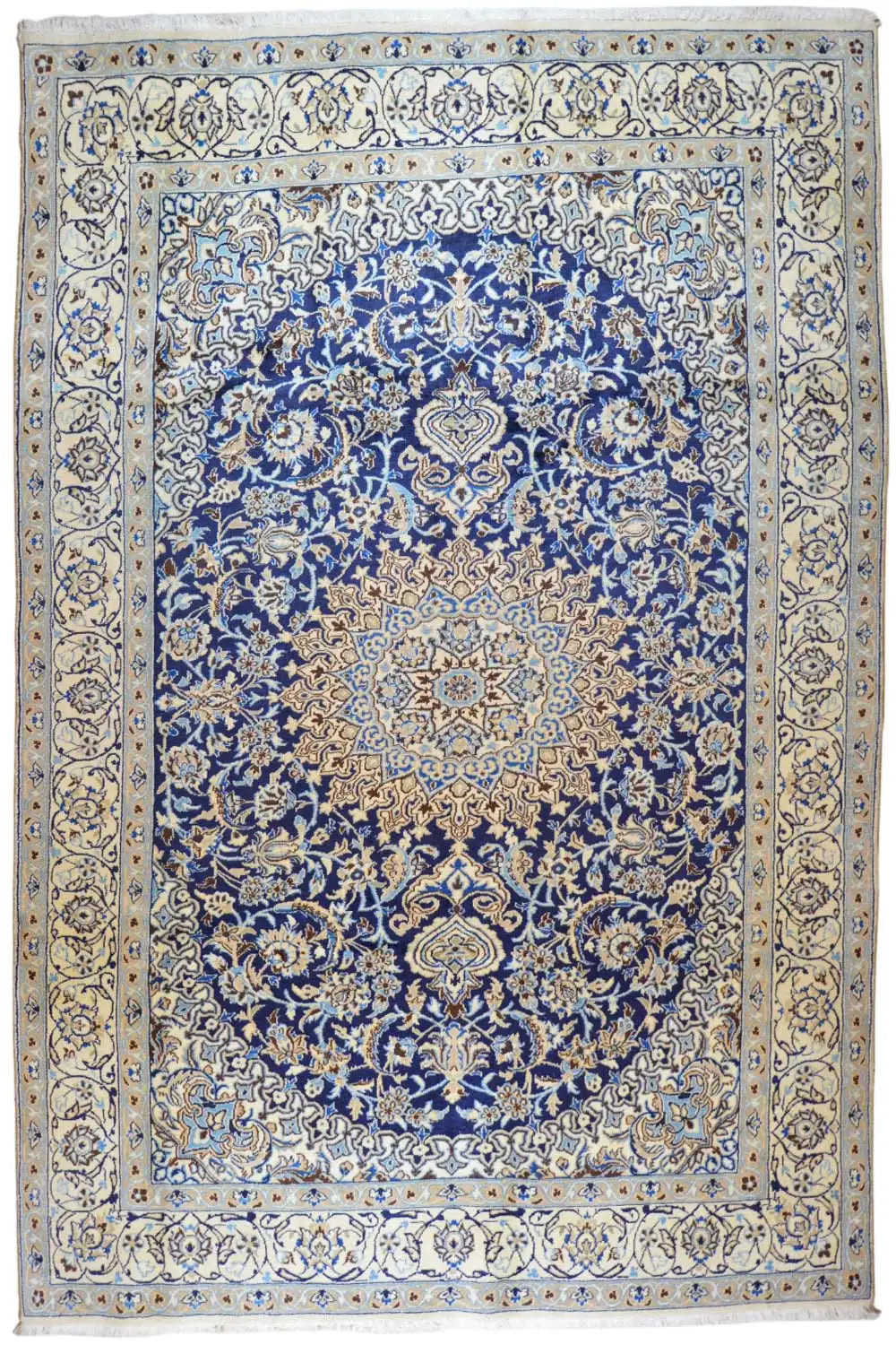 Blue-and-white Oriental rug with an ornamental medallion pattern and border trim.