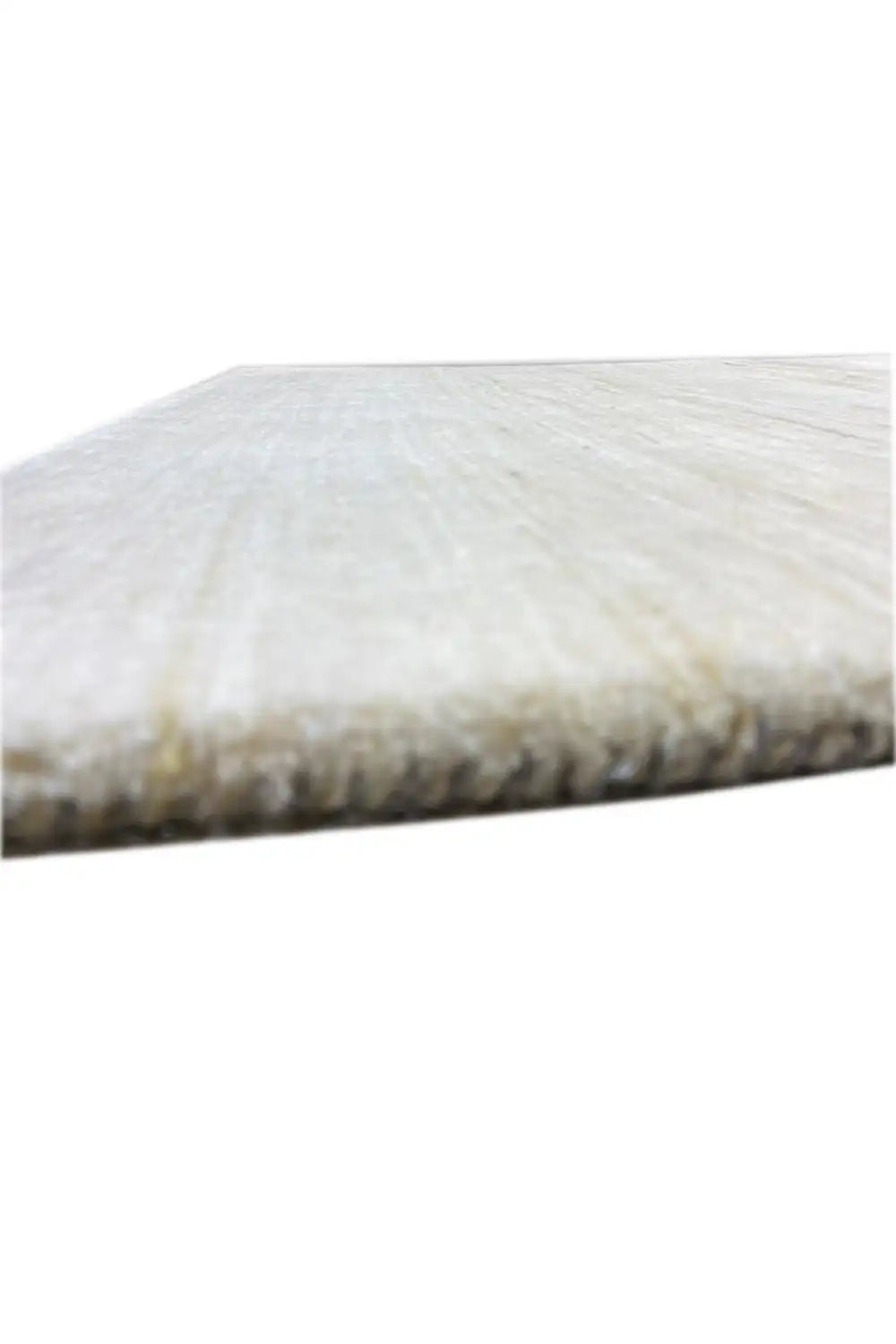 Gabbeh rug close-up: pile edge with fine light tones, side view