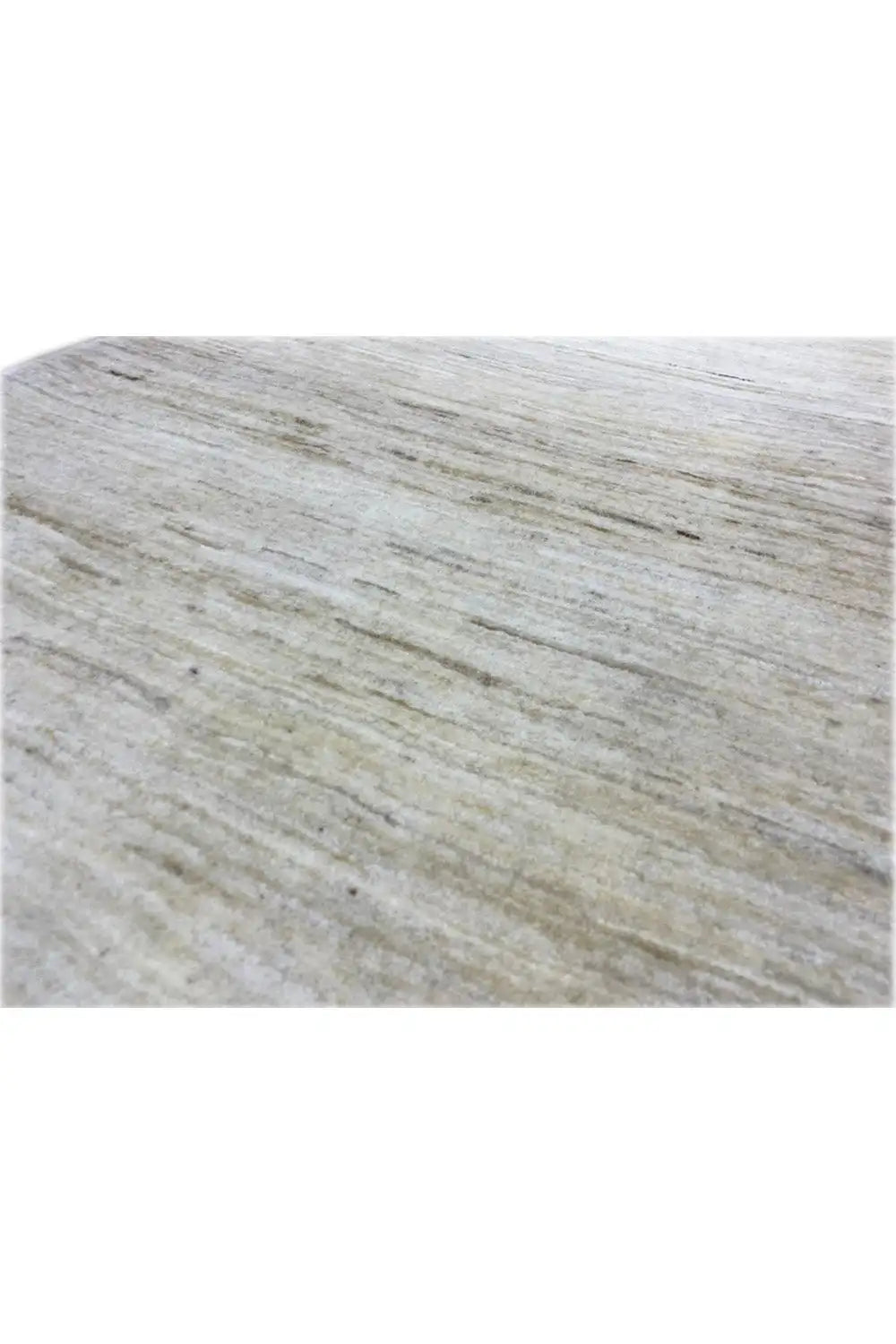 Gabbeh rug detail: mottled texture with fine lines, light beige tones