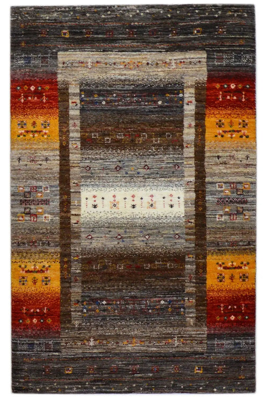 Gabbeh rug 129x80 cm with border pattern and multicolored ornaments in gray/red/yellow