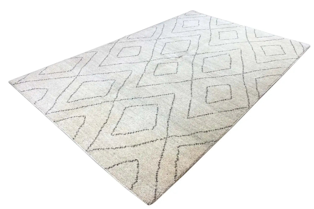 Beige Berber rug with gray diamond-pattern lines, square view