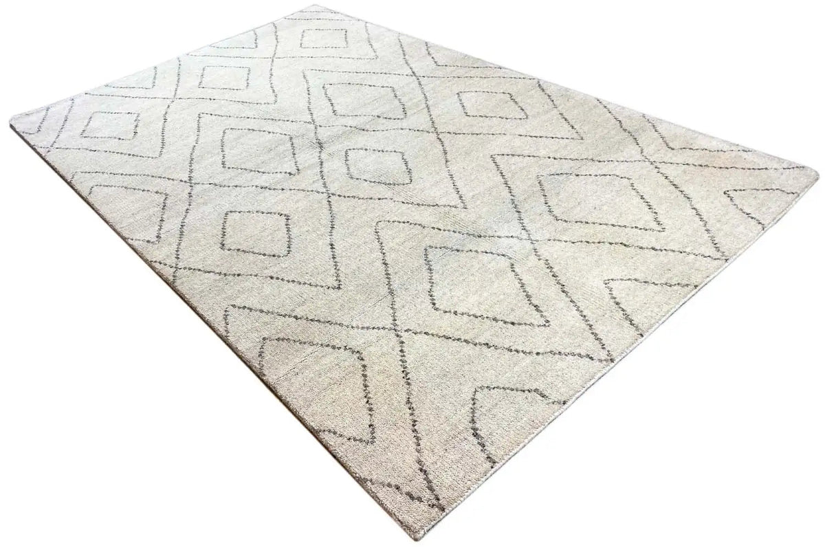 Beige Berber rug with gray geometric lines, triangular perspective