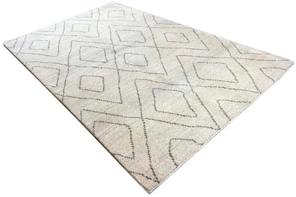 Beige Berber rug with gray geometric lines, triangular perspective