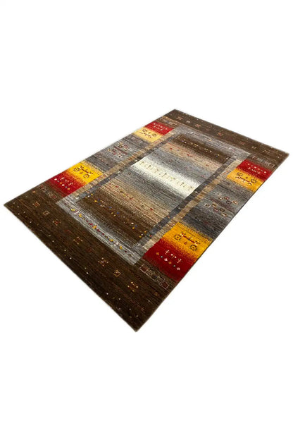 Carpet (160x99 cm) at an angle: dark brown area with a border of red and yellow squares