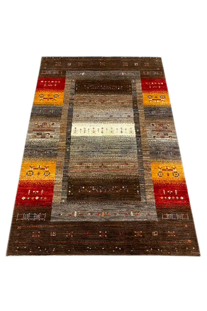 Gabbeh rug, borders in dark brown, ochre, and red, rectangular central motif