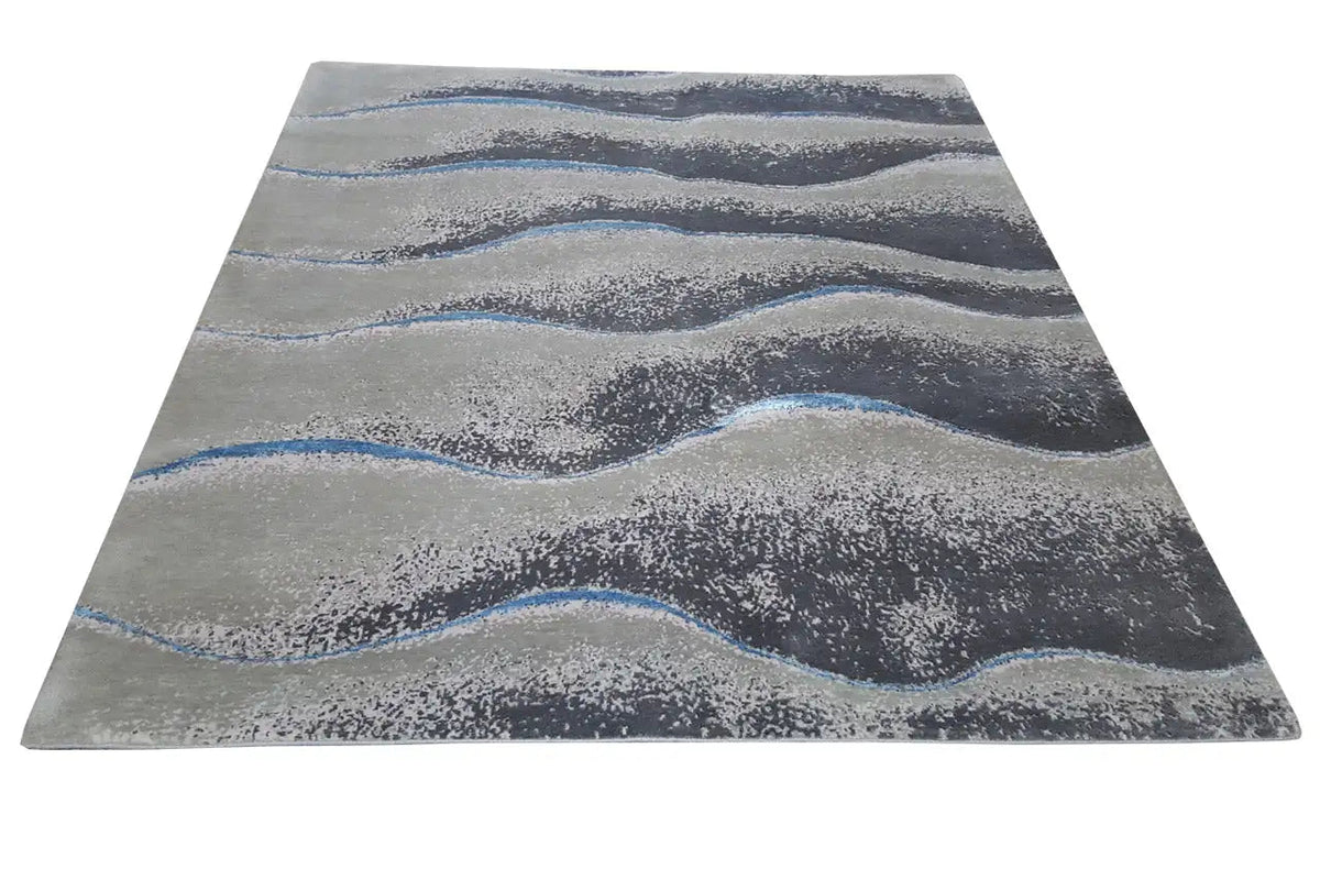 Beach mat 154x183 cm with a wavy pattern, gray with blue lines.