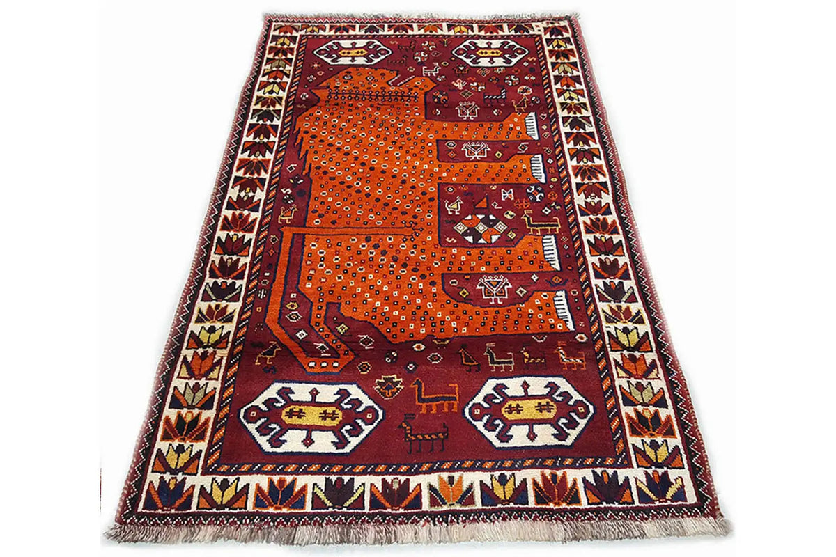 Gabbeh rug, burgundy/orange with geometric patterns and border, fringe