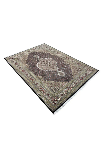 Rug with a brown background, floral diamond patterns, and a decorative border