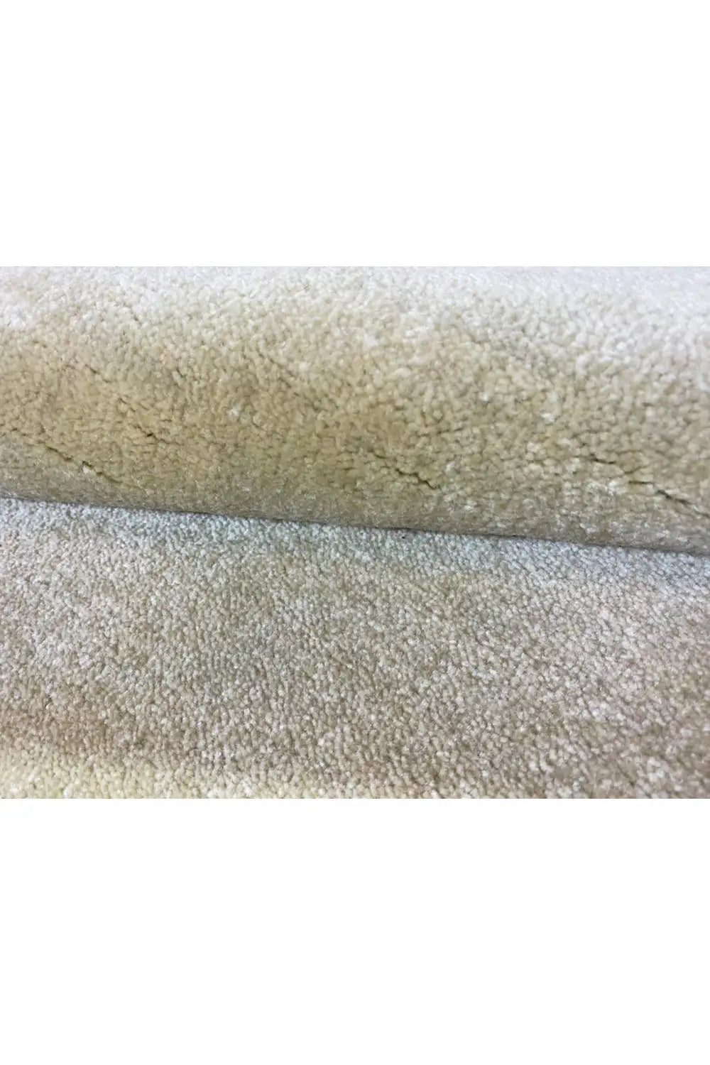 Gabbeh rug, close-up: light beige high pile with a sharply defined edge