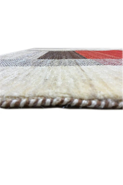 Gabbeh rug: beige border with short fringes, visible seam, and red/black pattern