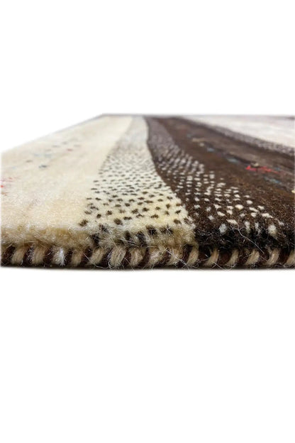 Gabbeh rug 122x116 cm close-up: pile and edge fringes, beige and brown tones